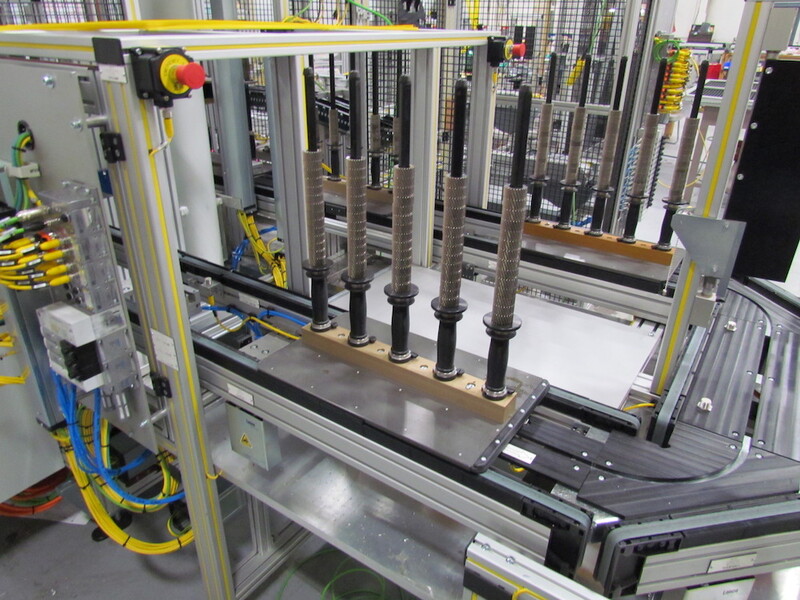 Skewers On Pallet Conveyor