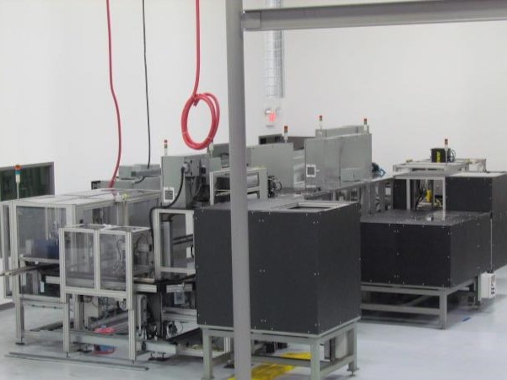 Pallet conveyor, multi-station automated assembly