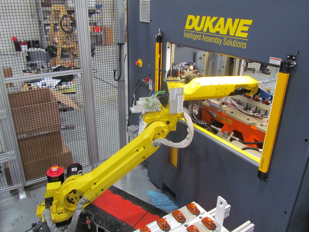 Vibratory welder tending