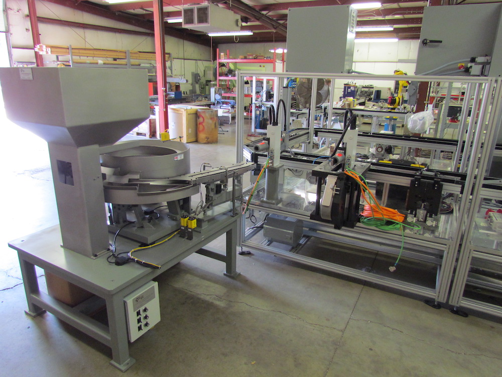 Vibratory bowl feeder on automated assembly line